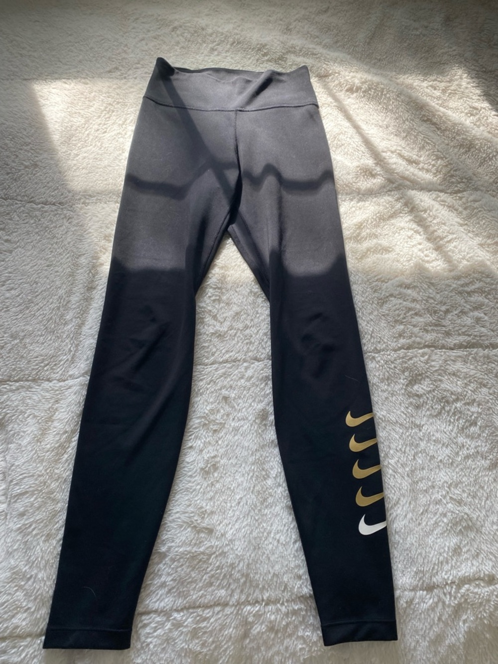 Nike Black Kids' Performance Leggings with Gold and White Swoosh Stack